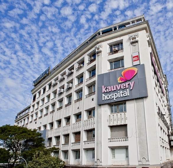 Kauvery Hospital building with its logo signage in Chennai